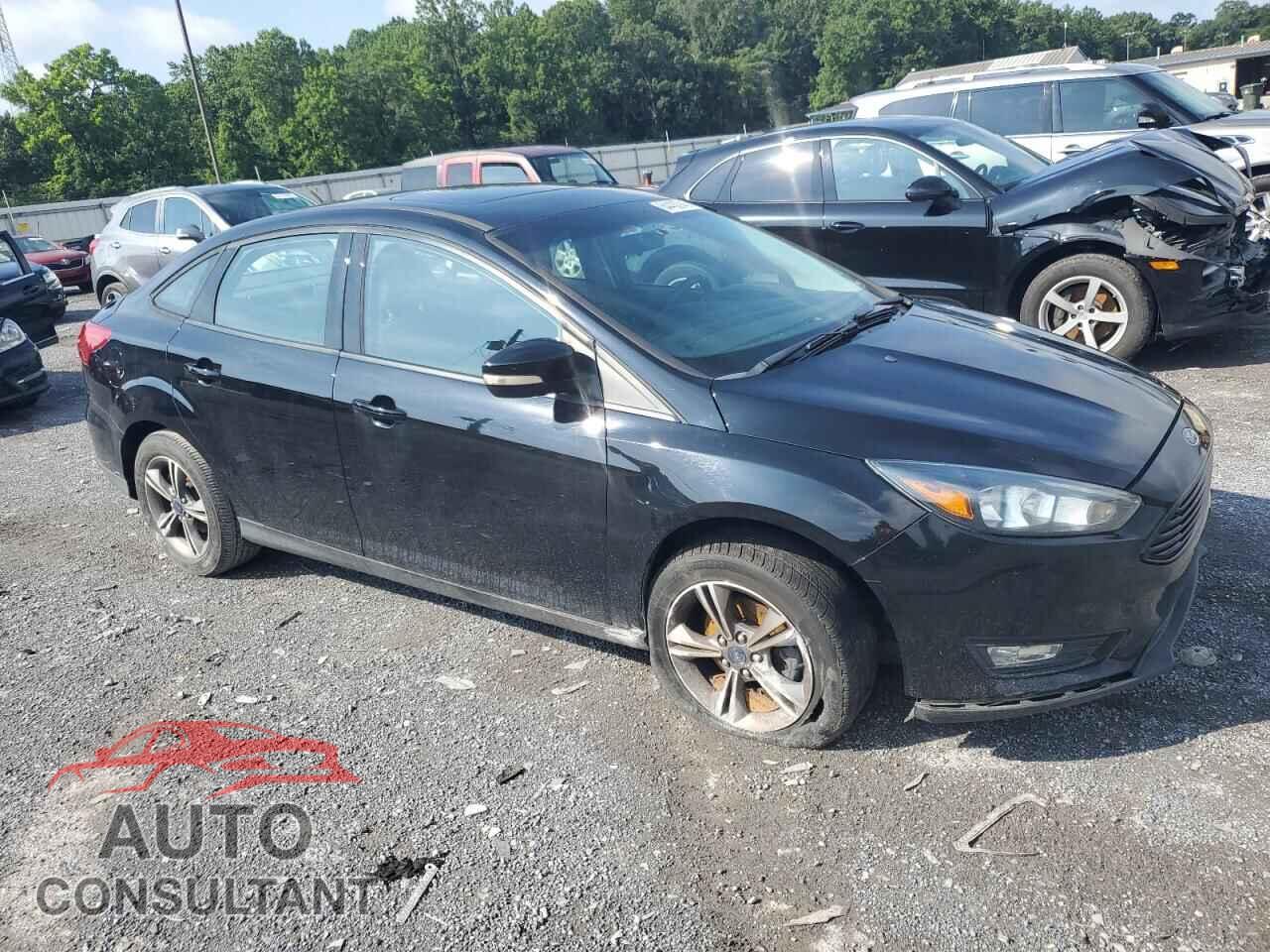 FORD FOCUS 2016 - 1FADP3FE3GL228283