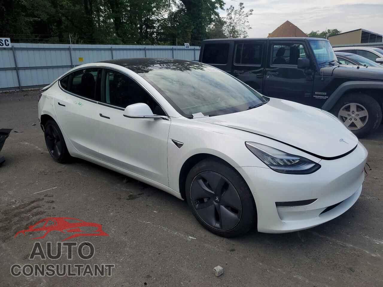 TESLA MODEL 3 2020 - 5YJ3E1EA6LF613459
