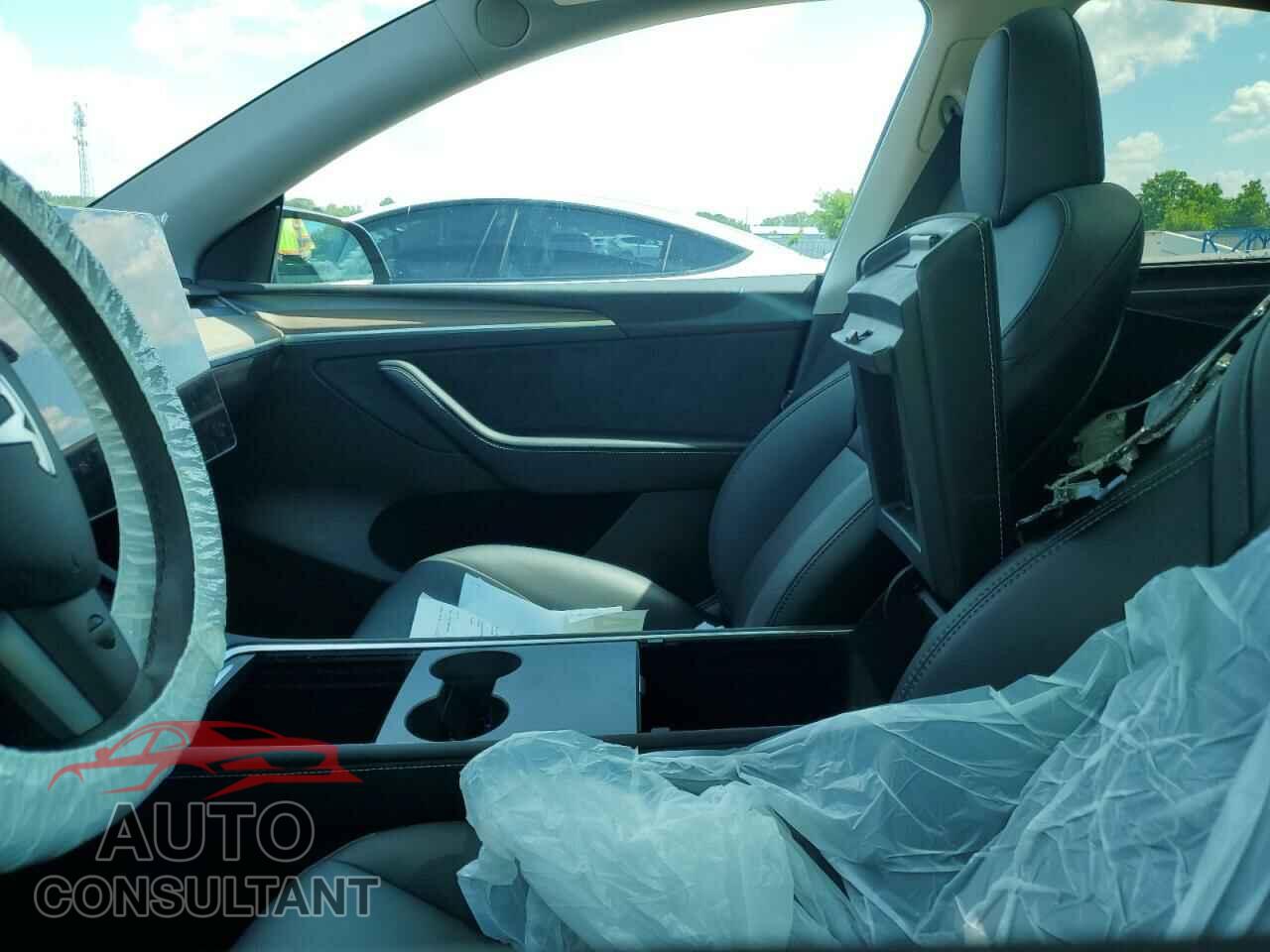 TESLA MODEL Y 2023 - LRWYGDFD1PC057653