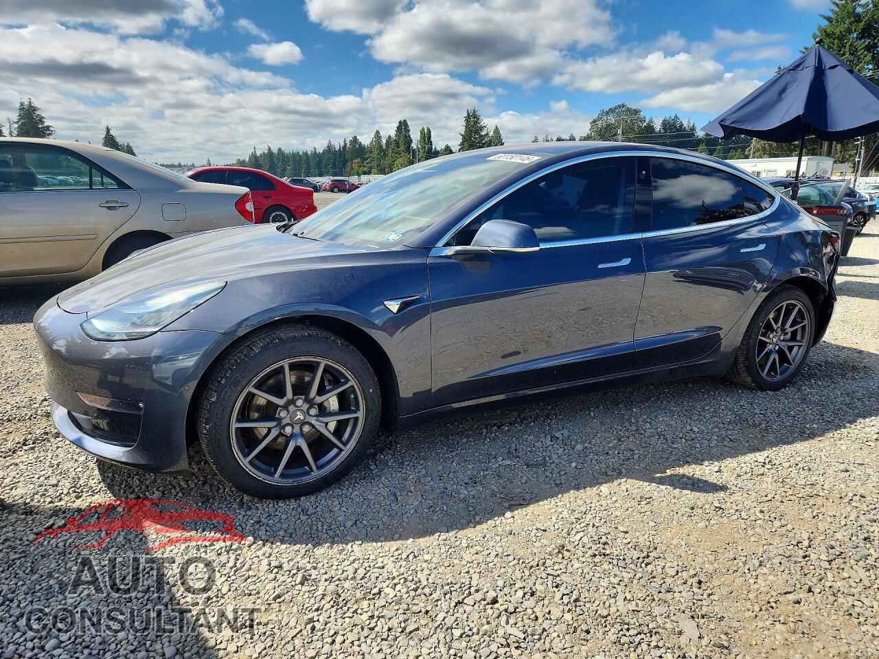 TESLA MODEL 3 2018 - 5YJ3E1EA0JF018877