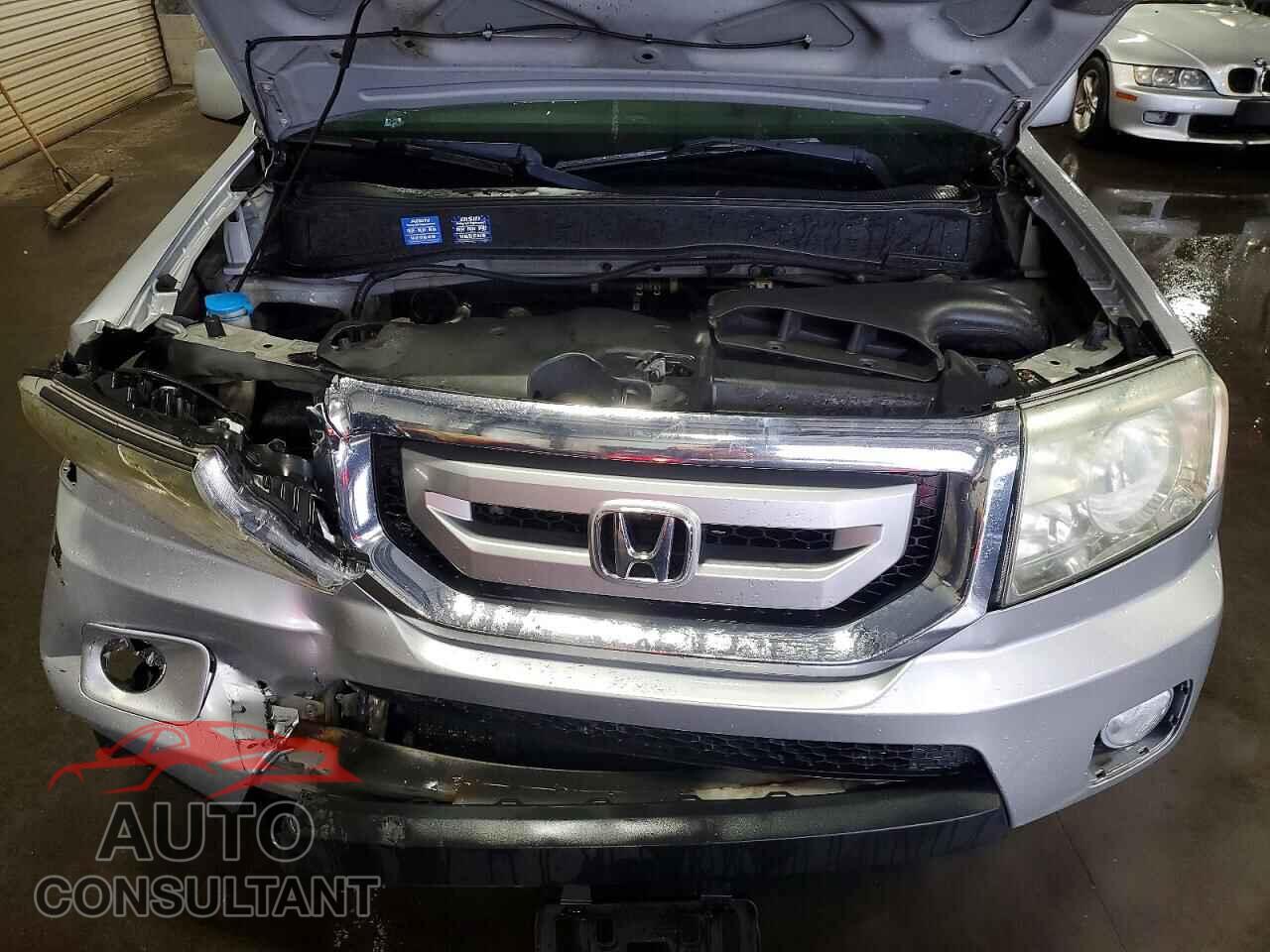 HONDA PILOT 2011 - 5FNYF4H58BB047452
