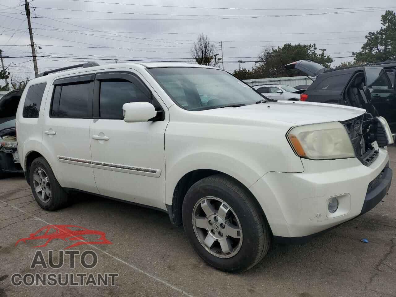 HONDA PILOT 2011 - 5FNYF4H90BB027165