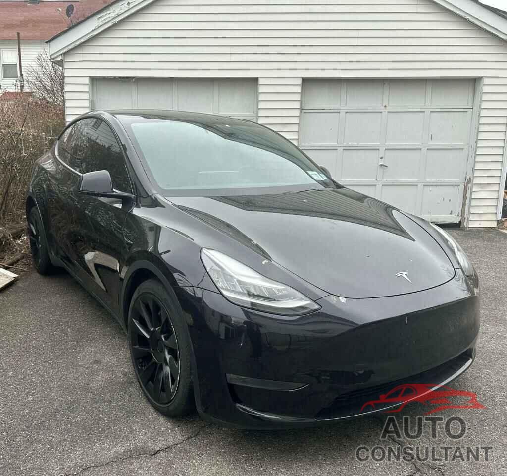 TESLA MODEL Y 2021 - 5YJYGDEE4MF066522