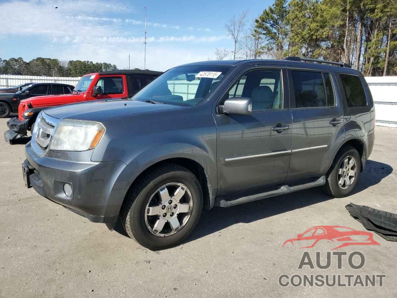 HONDA PILOT 2011 - 5FNYF4H97BB042570