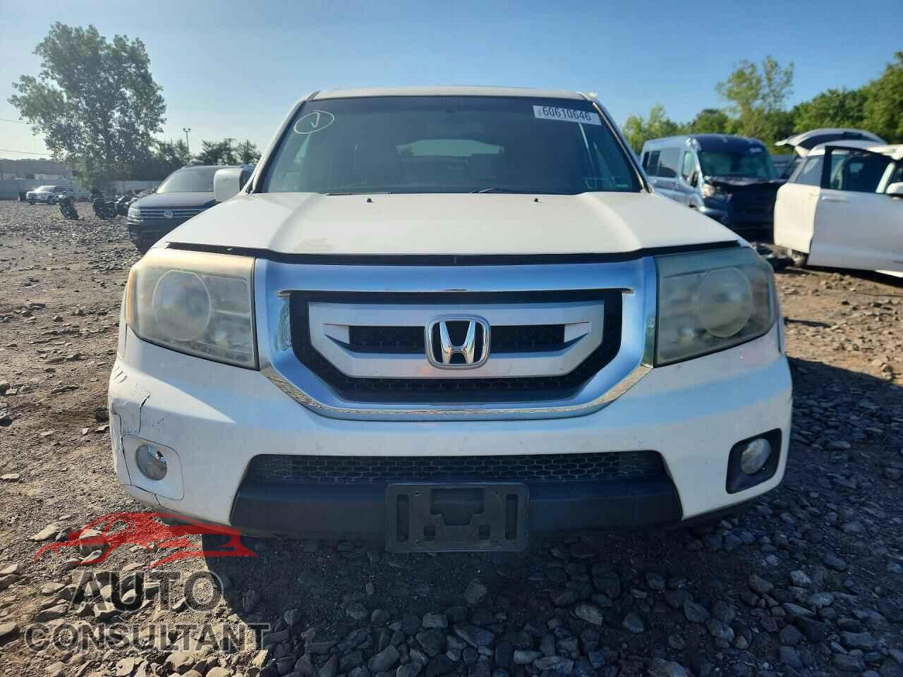 HONDA PILOT 2011 - 5FNYF4H67BB060668
