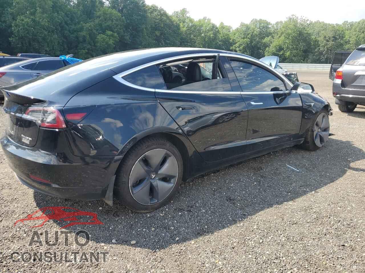 TESLA MODEL 3 2018 - 5YJ3E1EB0JF073211