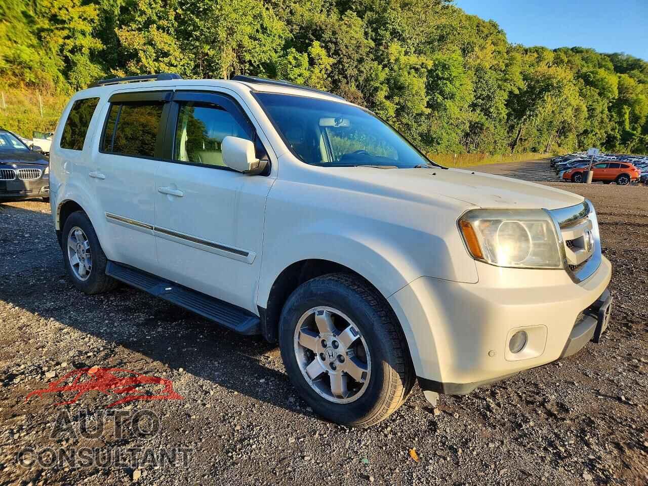 HONDA PILOT 2011 - 5FNYF4H99BB095318