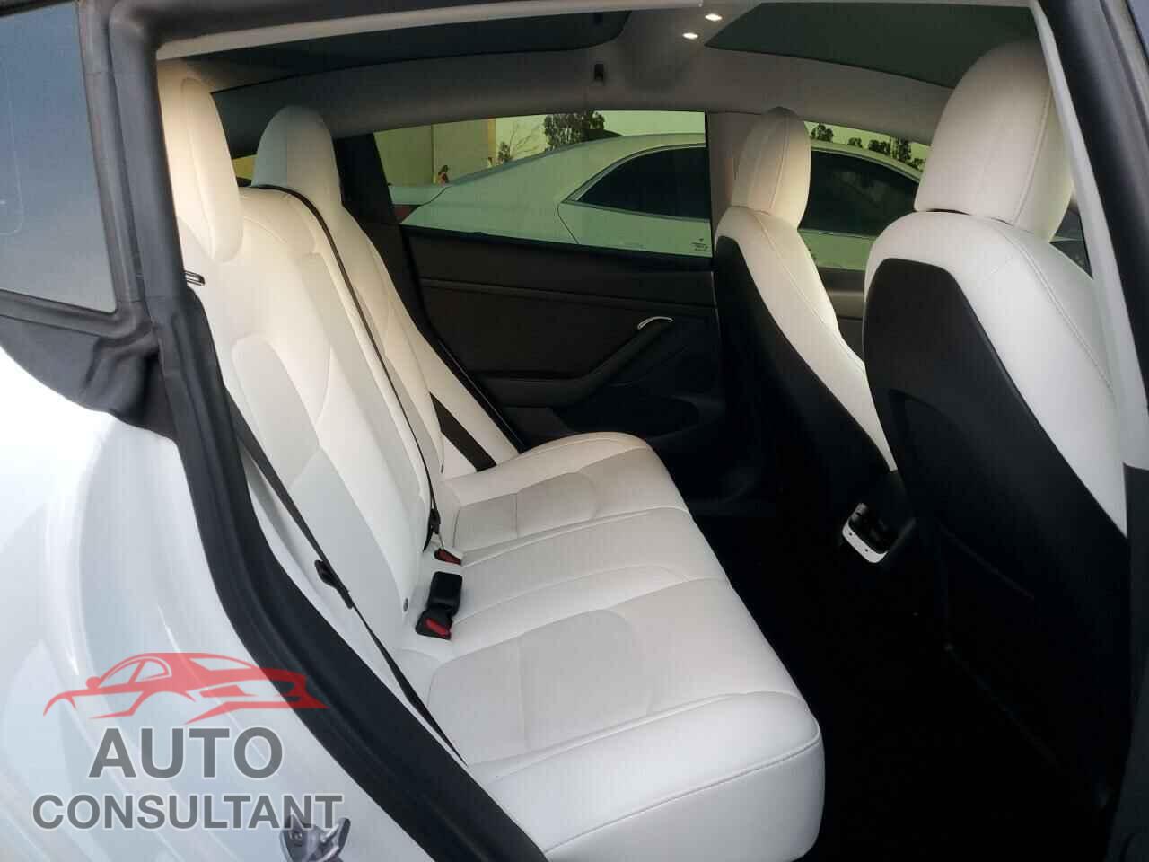 TESLA MODEL 3 2021 - 5YJ3E1EB8MF999487