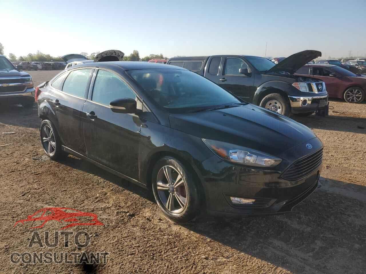 FORD FOCUS 2017 - 1FADP3FE0HL284361