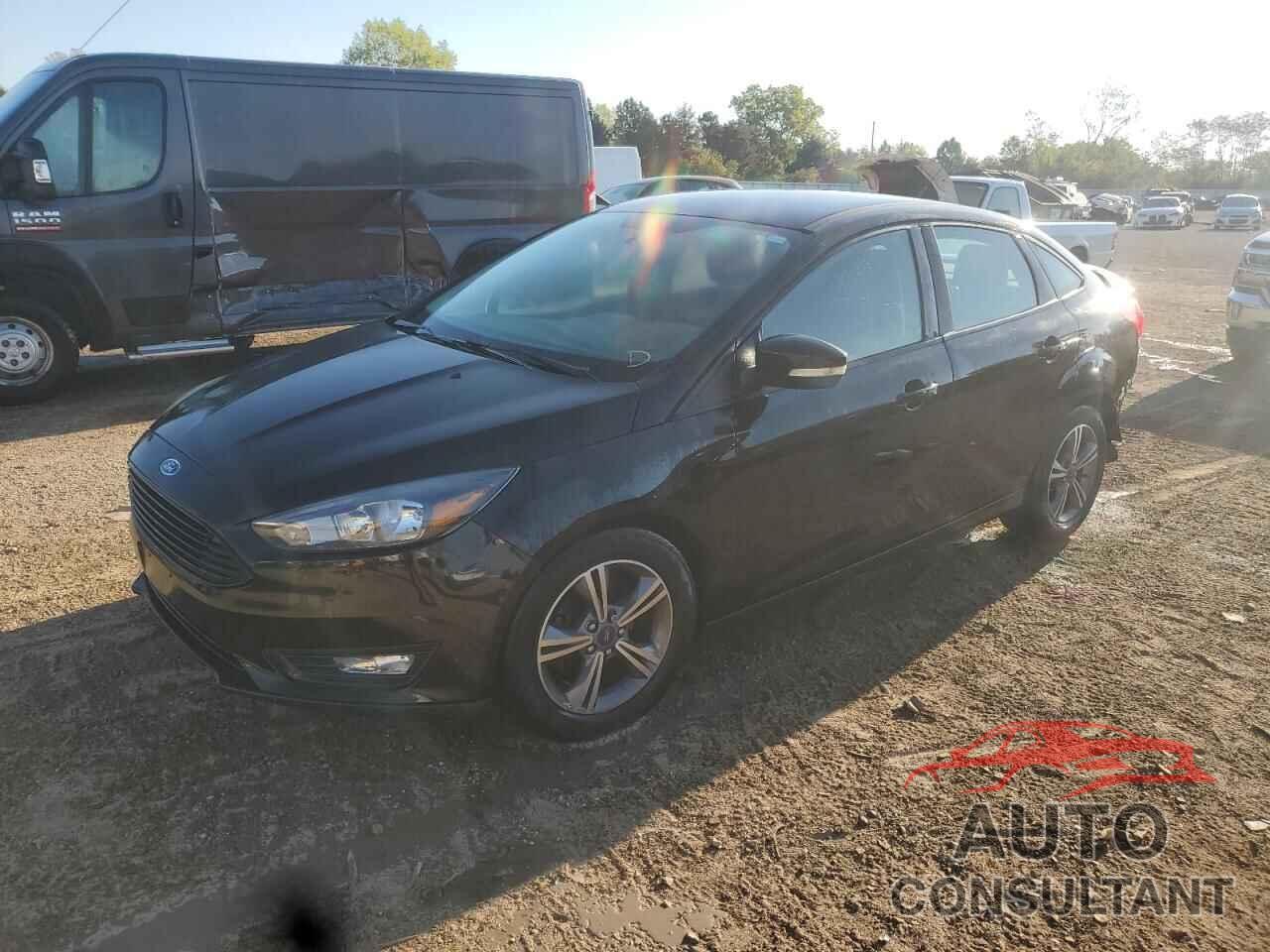 FORD FOCUS 2017 - 1FADP3FE0HL284361
