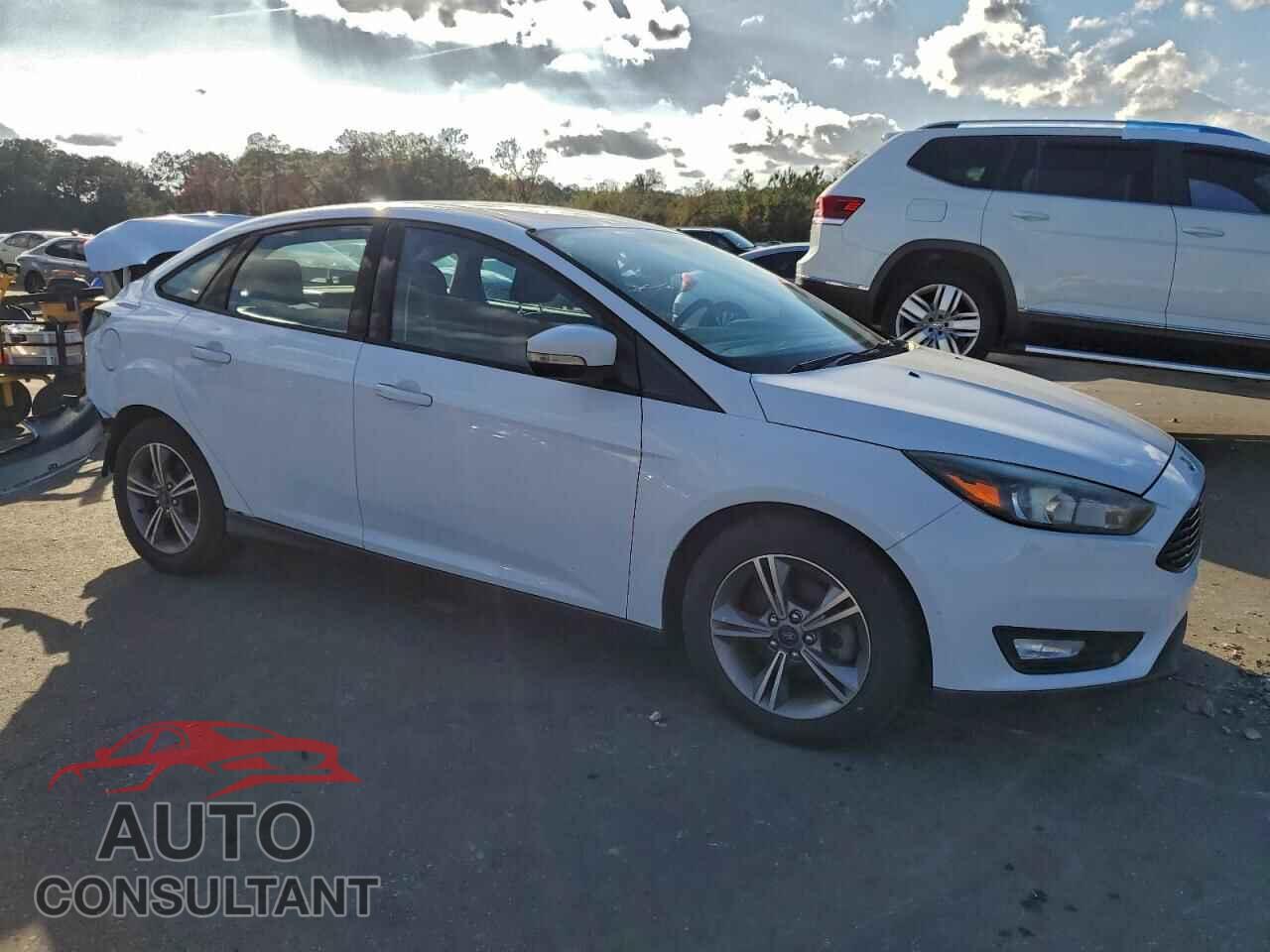 FORD FOCUS 2017 - 1FADP3FE1HL317478