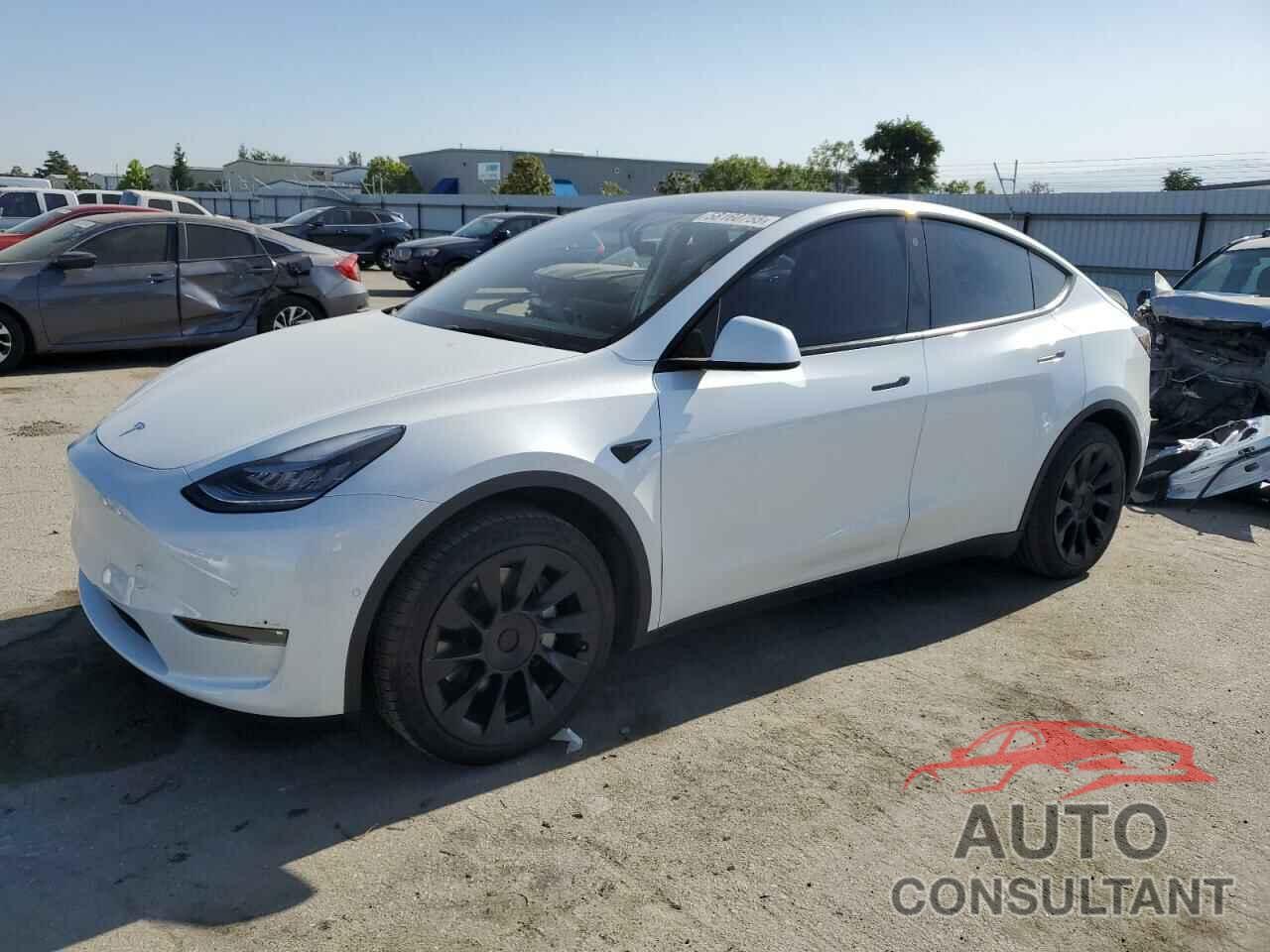 TESLA MODEL Y 2021 - 5YJYGAED9MF142757