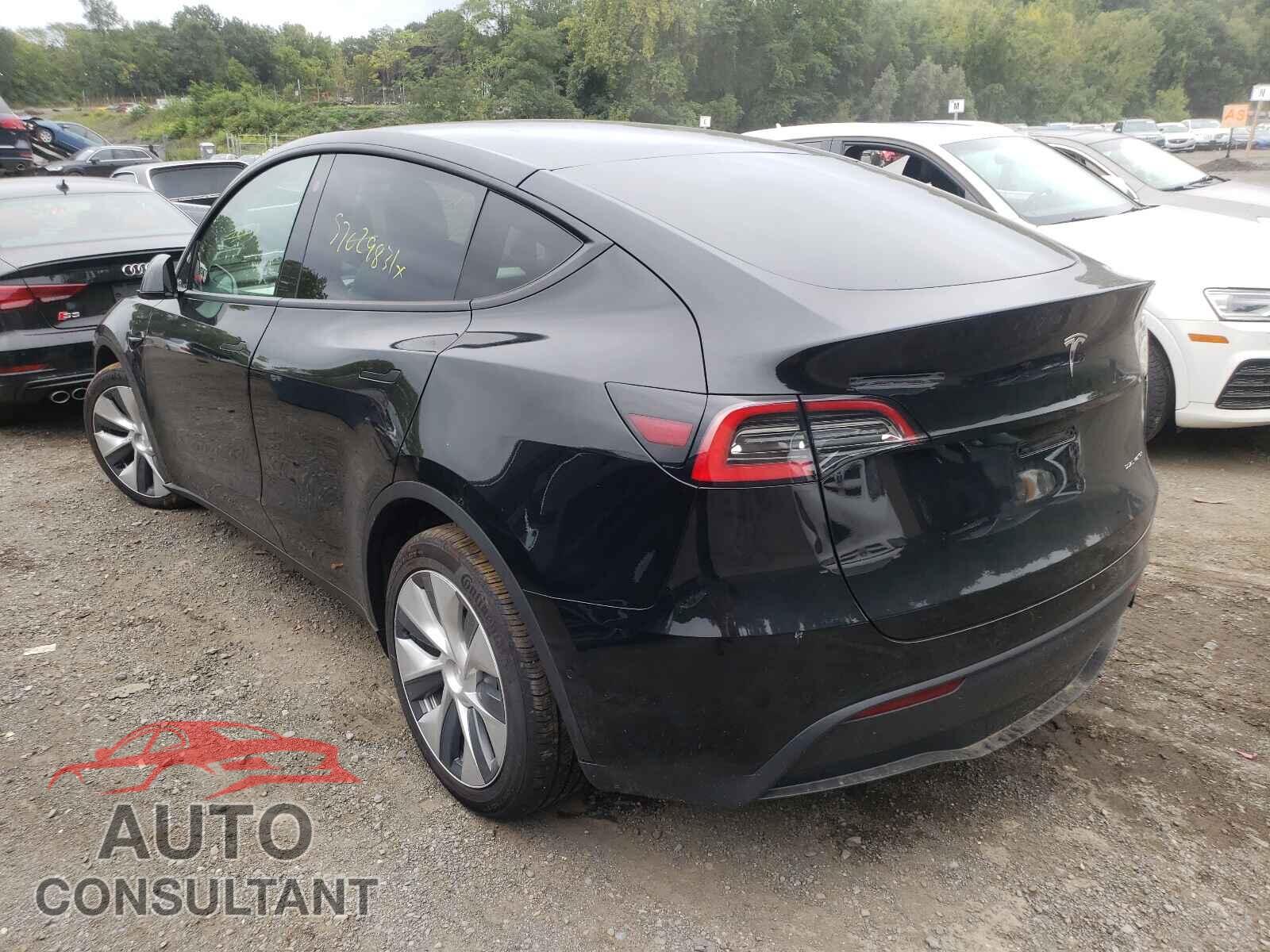 TESLA MODEL Y 2021 - 5YJYGDEEXMF140333