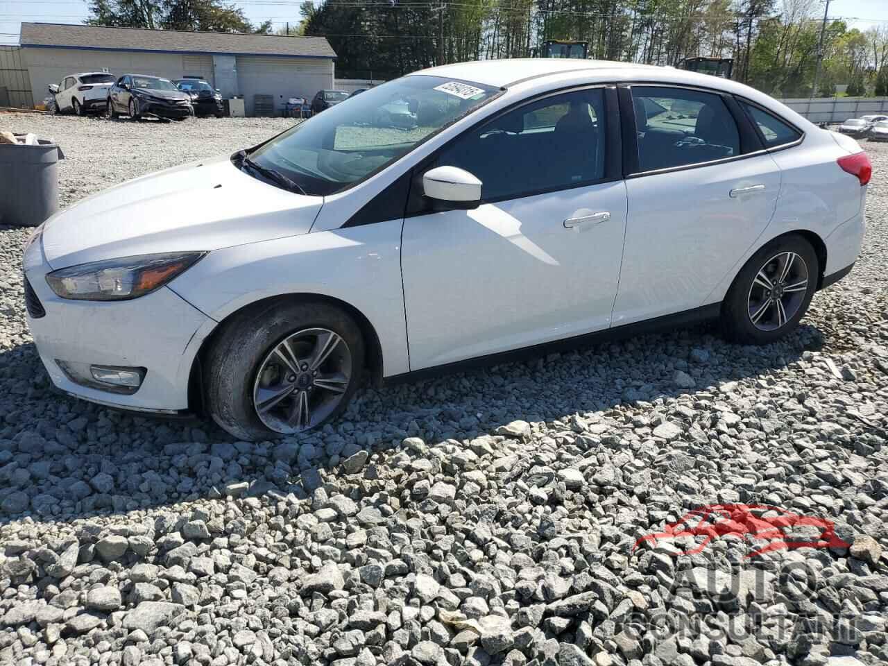 FORD FOCUS 2018 - 1FADP3FE4JL220247