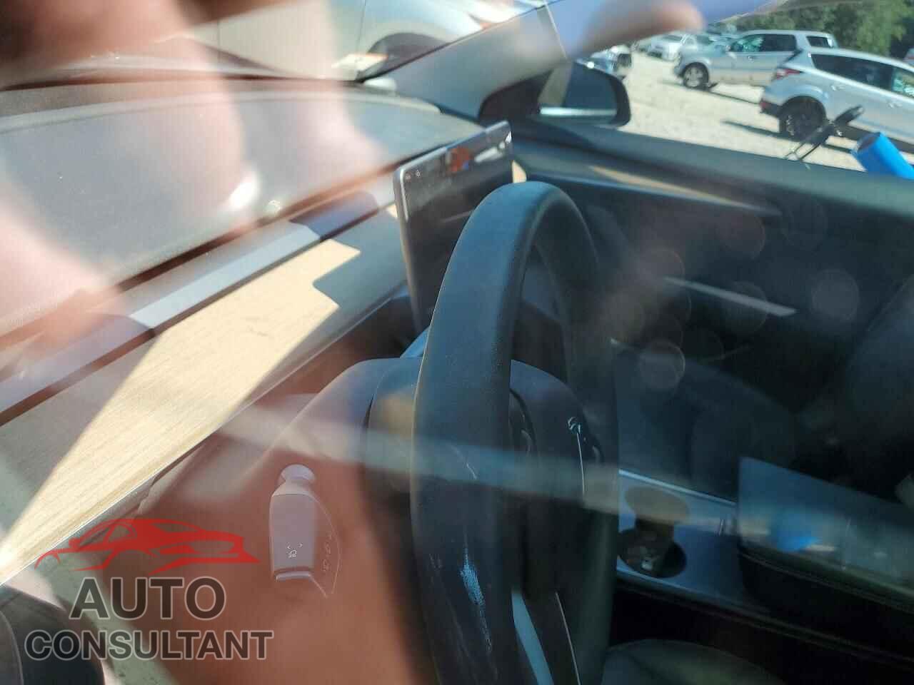 TESLA MODEL 3 2021 - 5YJ3E1EA9MF083022