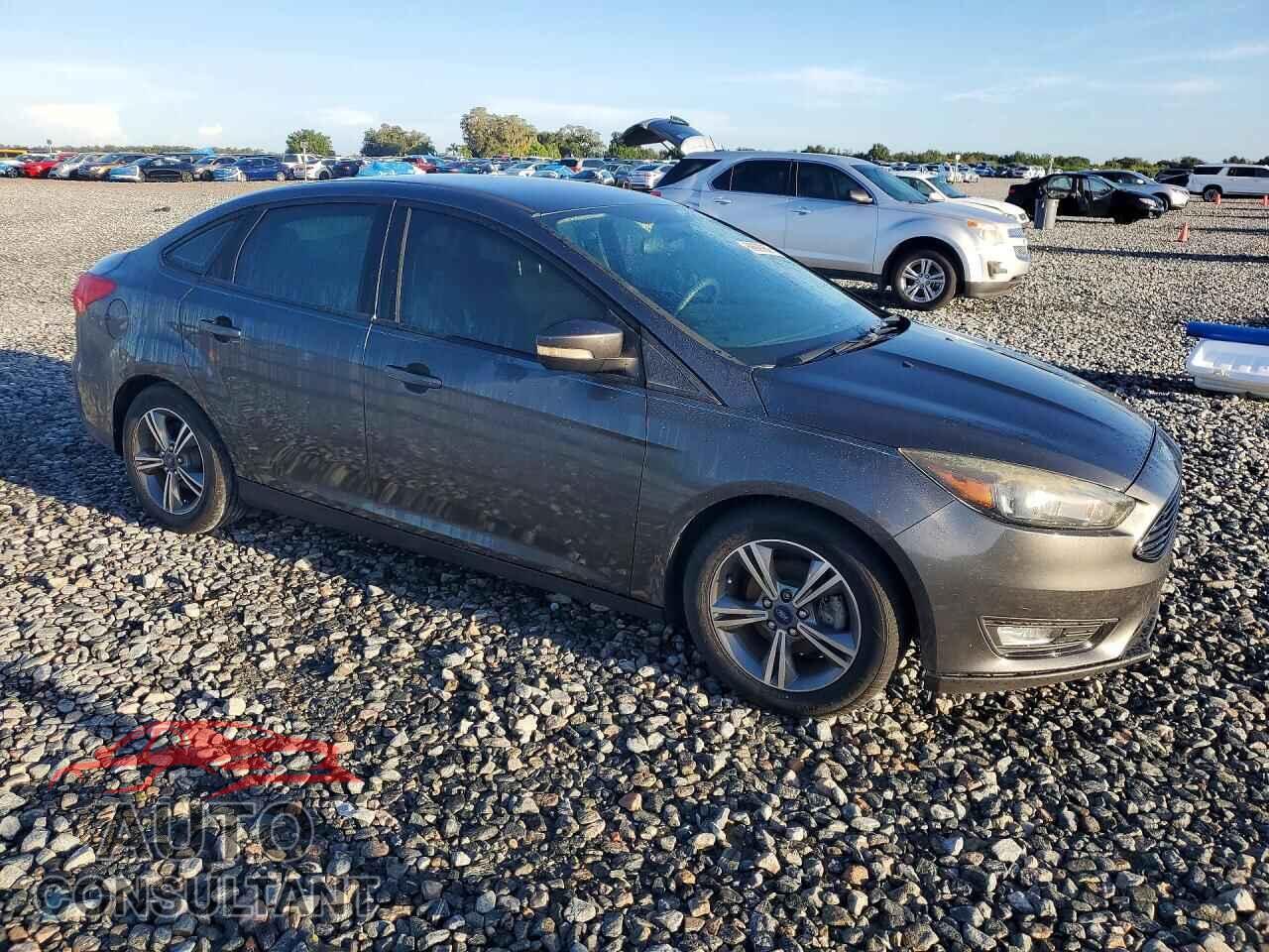FORD FOCUS 2016 - 1FADP3FE6GL393759
