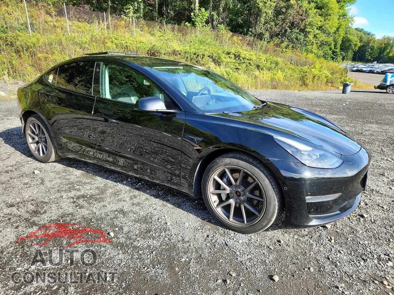 TESLA MODEL 3 2021 - 5YJ3E1EB0MF992565
