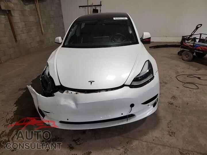 TESLA MODEL 3 2021 - 5YJ3E1EAXMF982150
