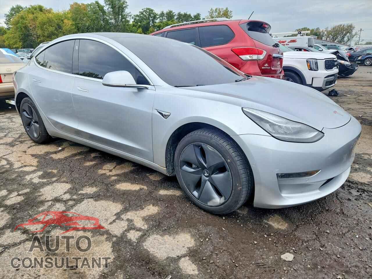 TESLA MODEL 3 2018 - 5YJ3E1EB0JF065075