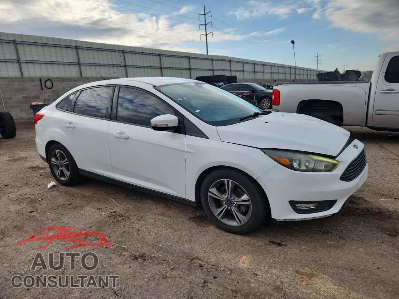 FORD FOCUS 2017 - 1FADP3FE3HL329213