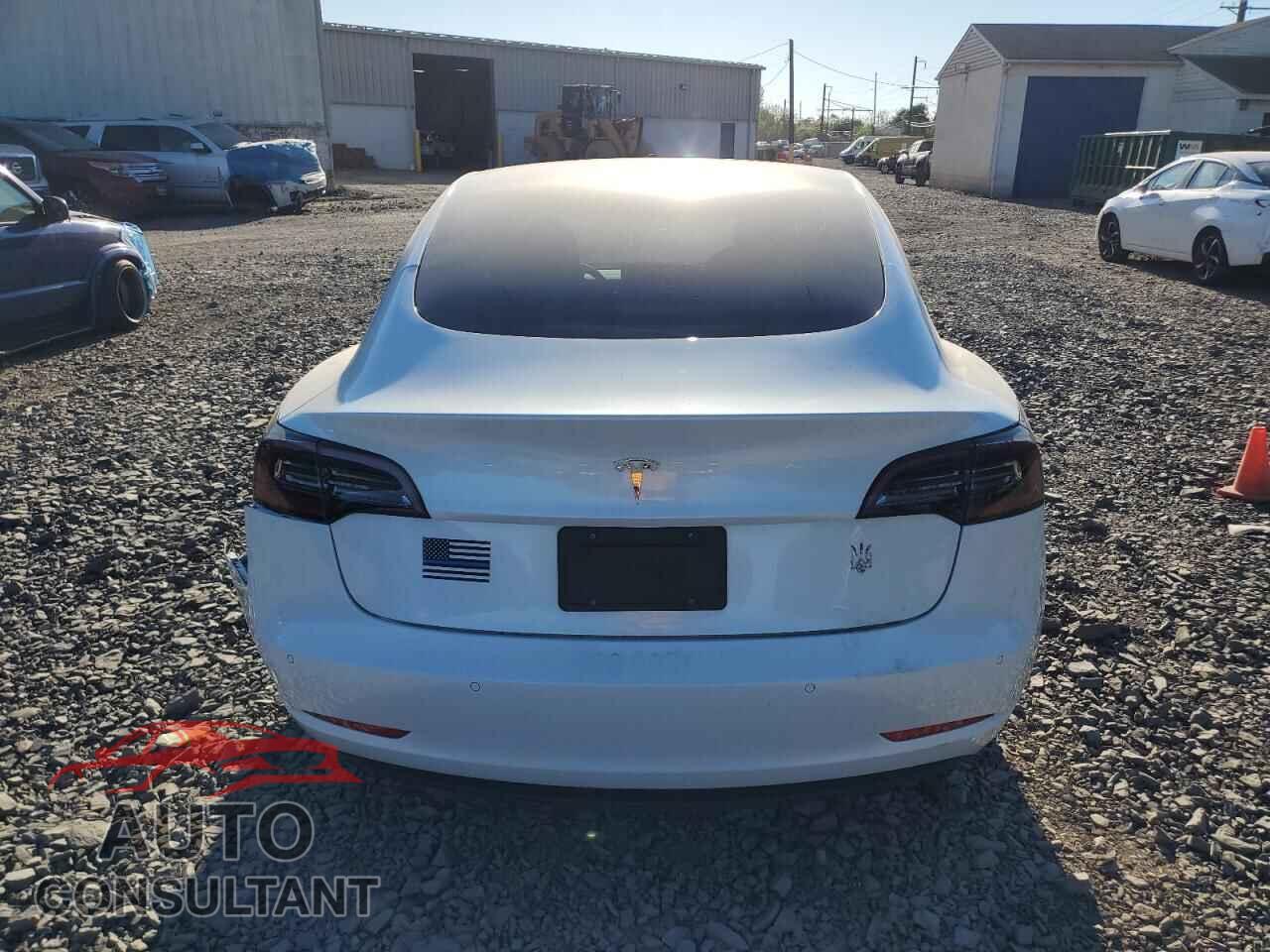 TESLA MODEL 3 2022 - 5YJ3E1EA0NF302595