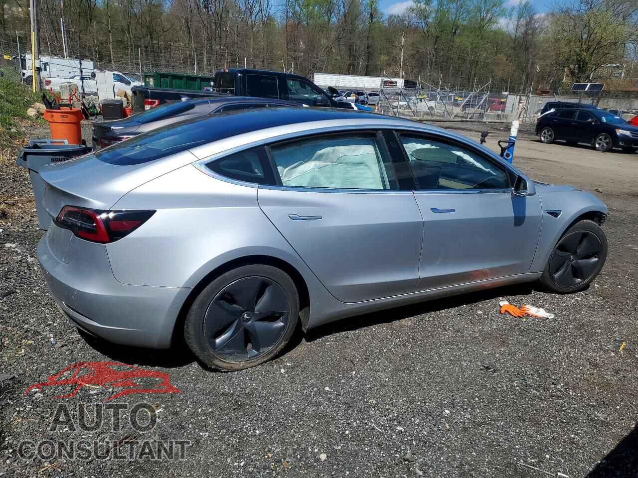 TESLA MODEL 3 2018 - 5YJ3E1EA5JF040423
