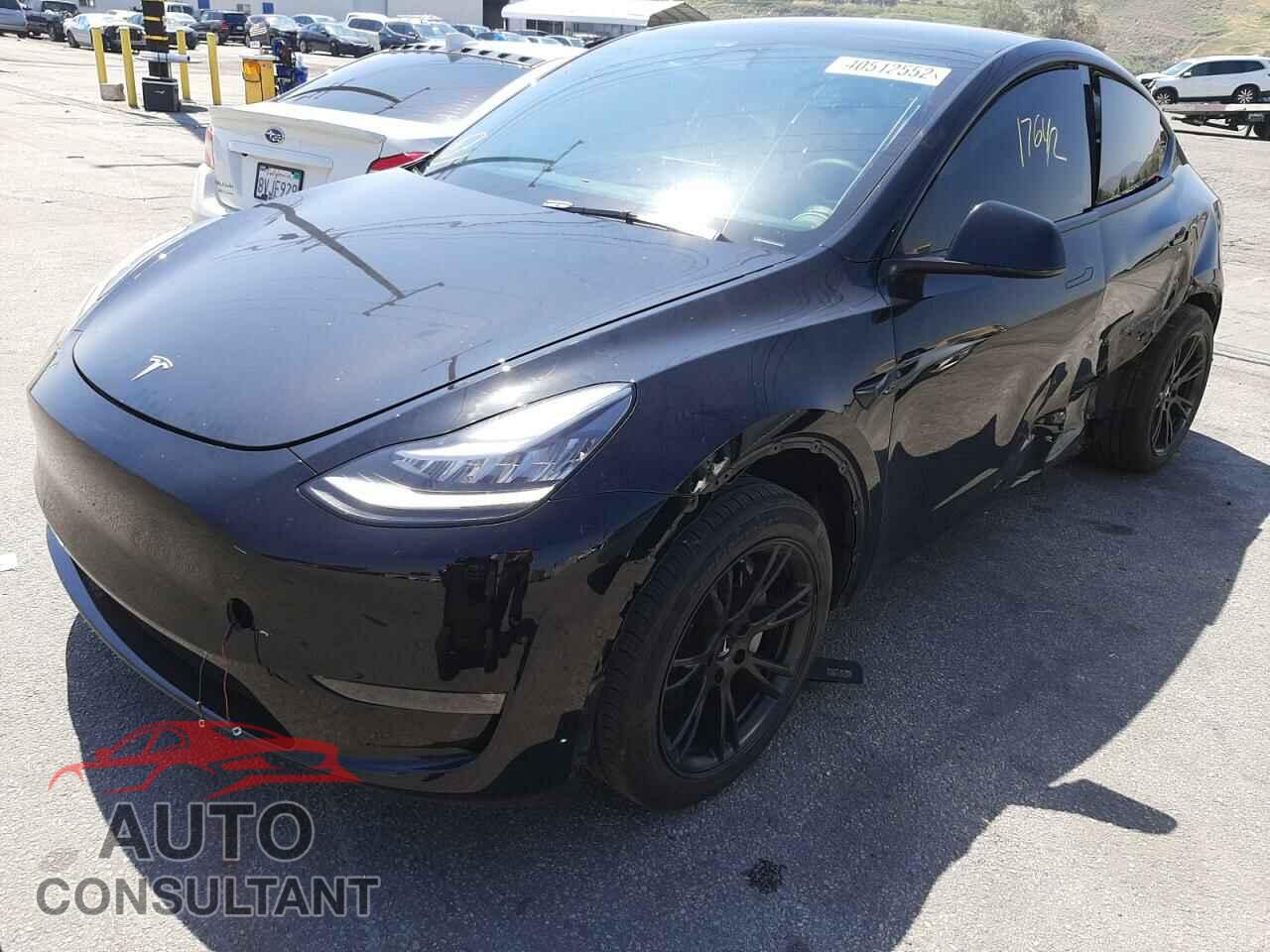 TESLA MODEL Y 2021 - 5YJYGDED0MF133396