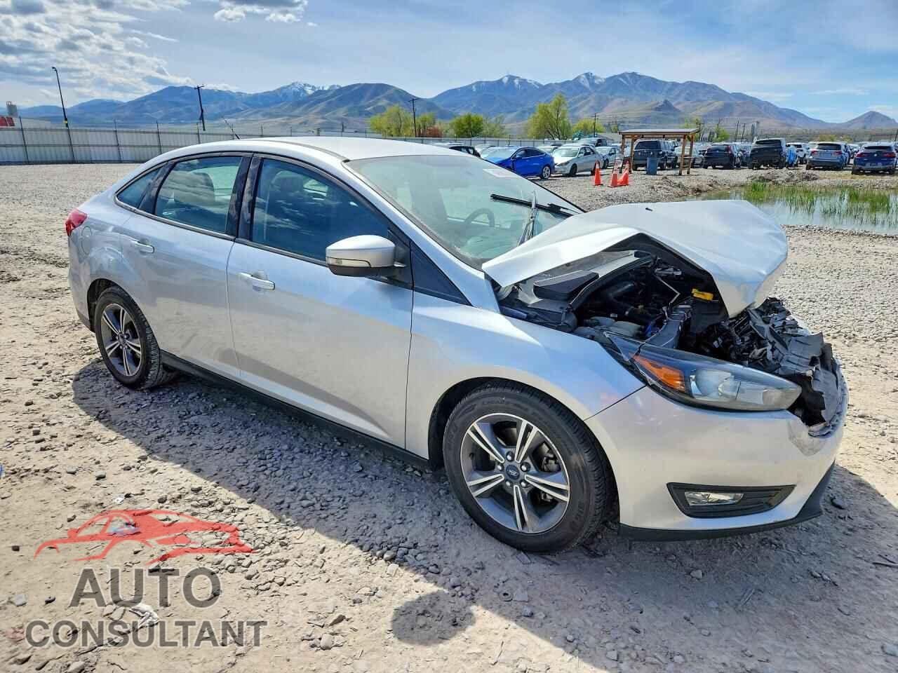FORD FOCUS 2016 - 1FADP3FE1GL405302