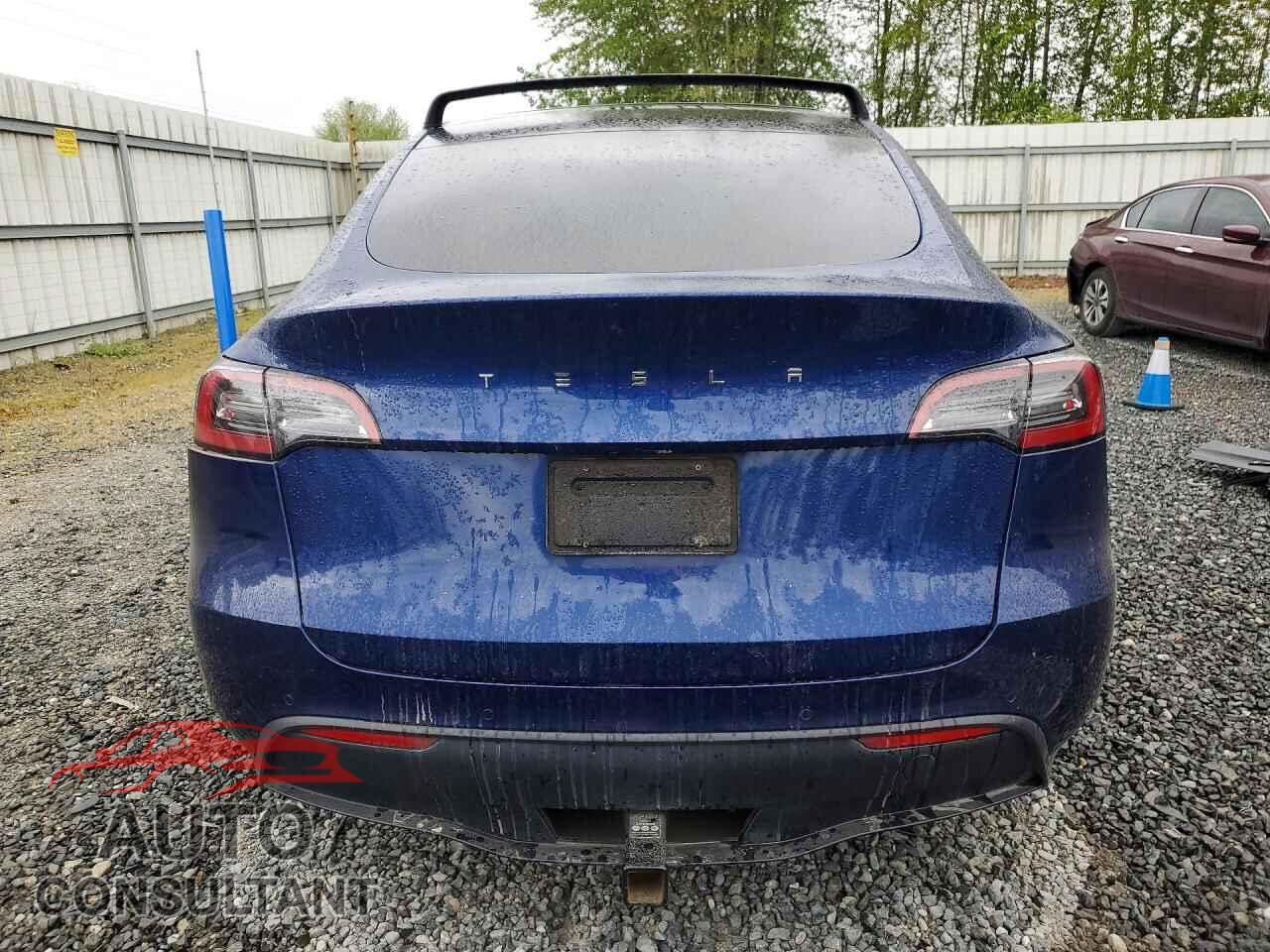 TESLA MODEL Y 2021 - 5YJYGAEEXMF214039