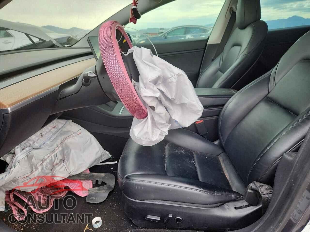 TESLA MODEL 3 2021 - 5YJ3E1EB9MF869377