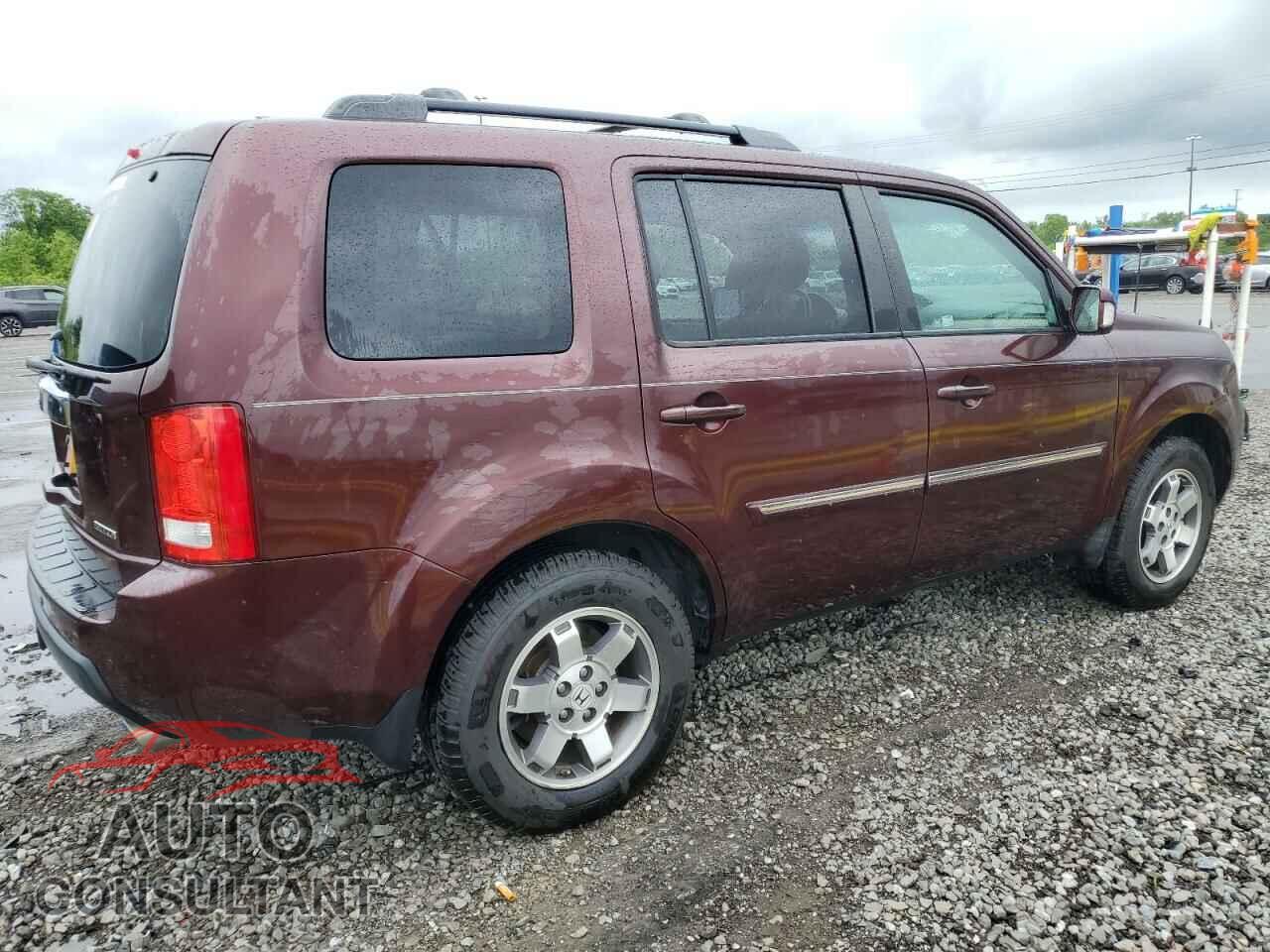 HONDA PILOT 2011 - 5FNYF3H94BB039121