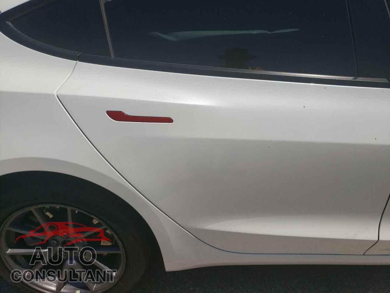 TESLA MODEL 3 2021 - 5YJ3E1EAXMF940528