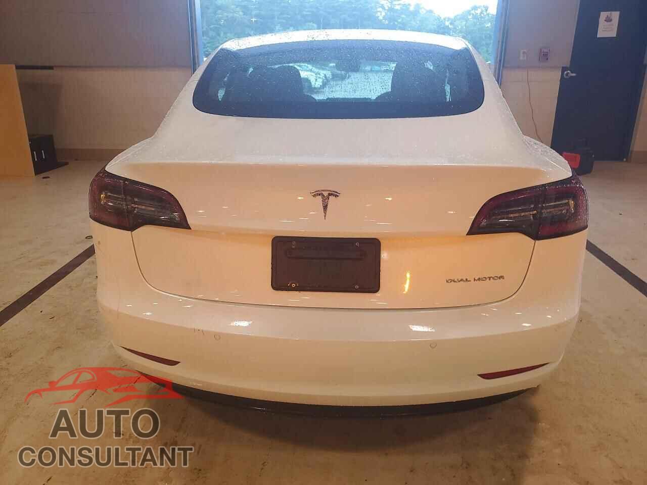 TESLA MODEL 3 2021 - 5YJ3E1EB3MF065396