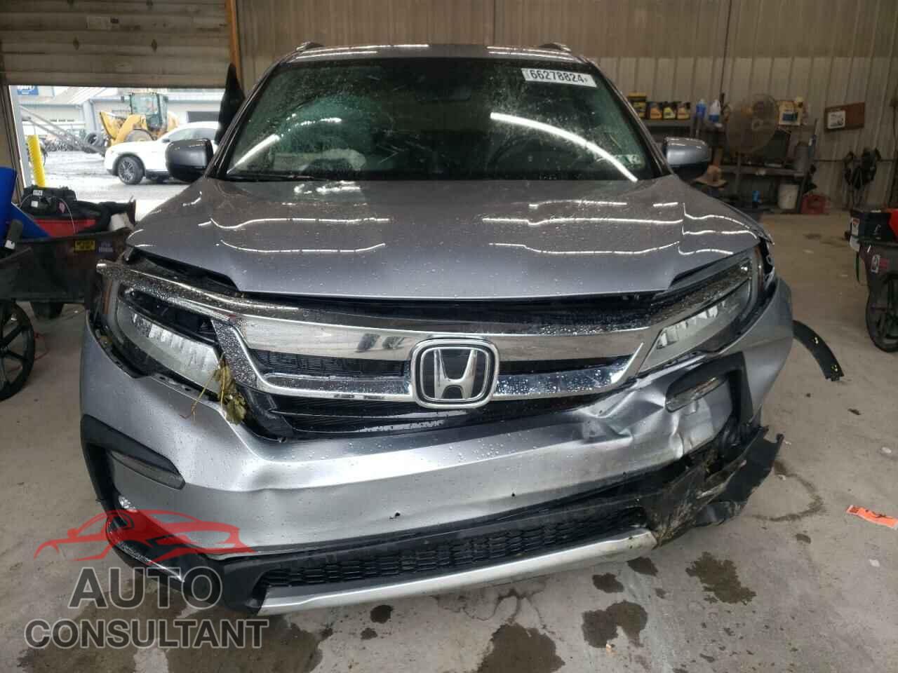 HONDA PILOT 2020 - 5FNYF6H92LB004029