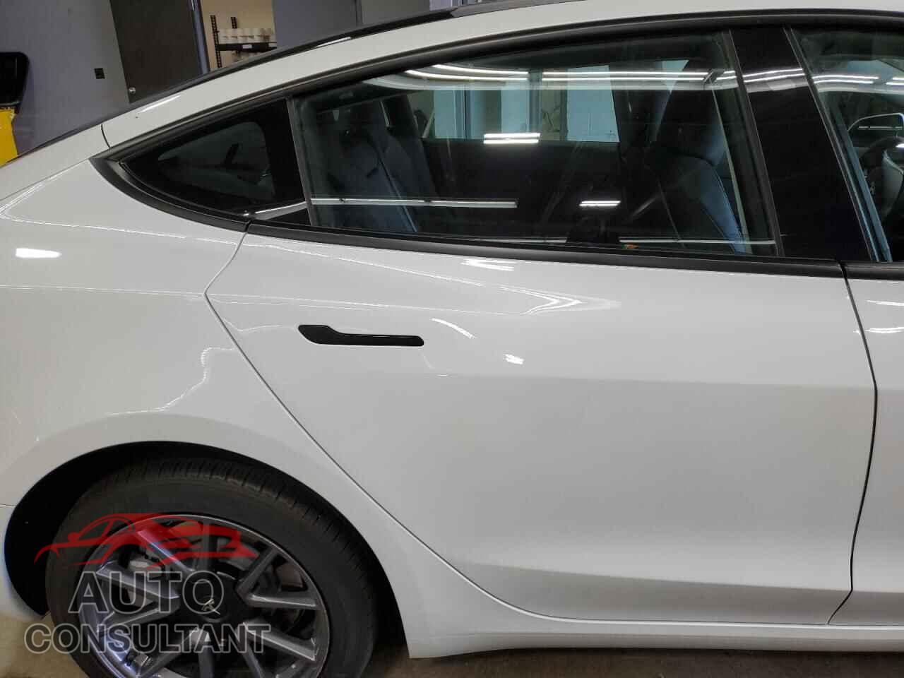 TESLA MODEL 3 2023 - 5YJ3E1EA0PF606982