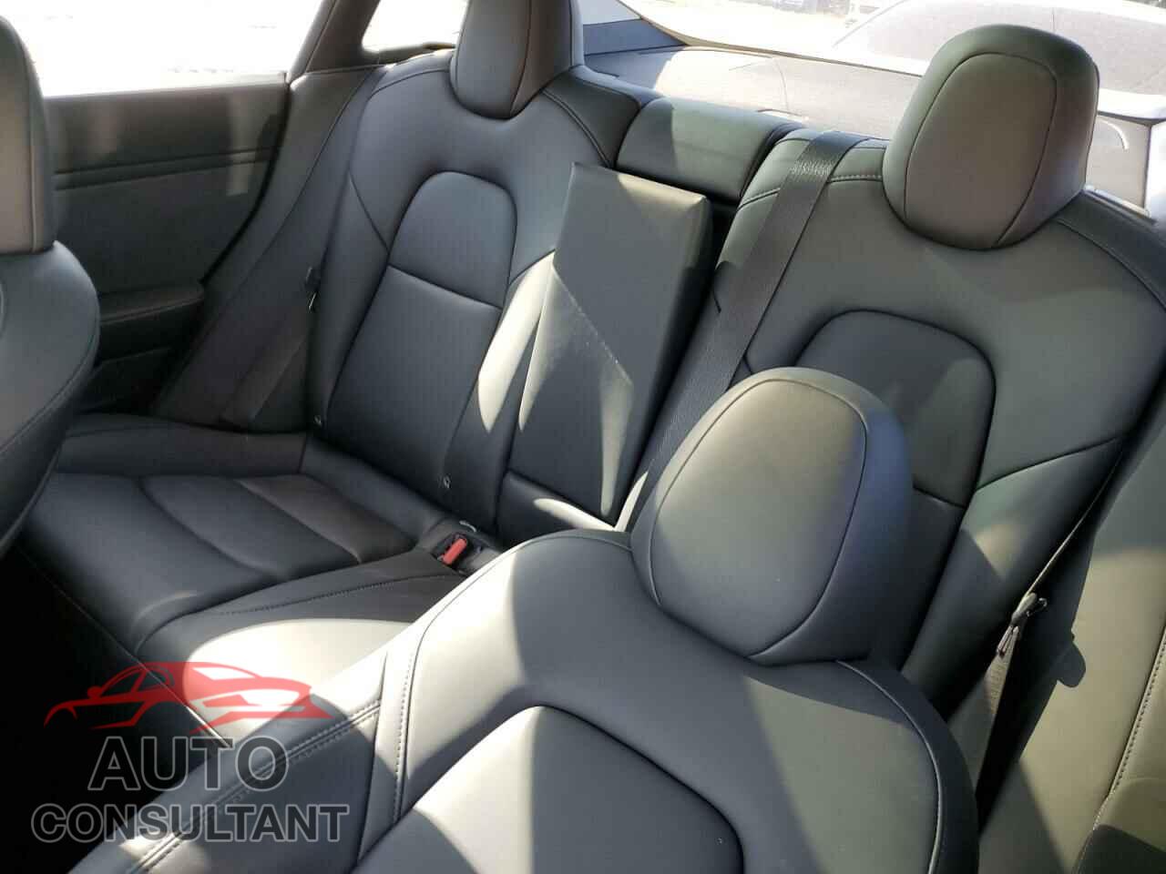 TESLA MODEL 3 2023 - 5YJ3E1EC5PF563063