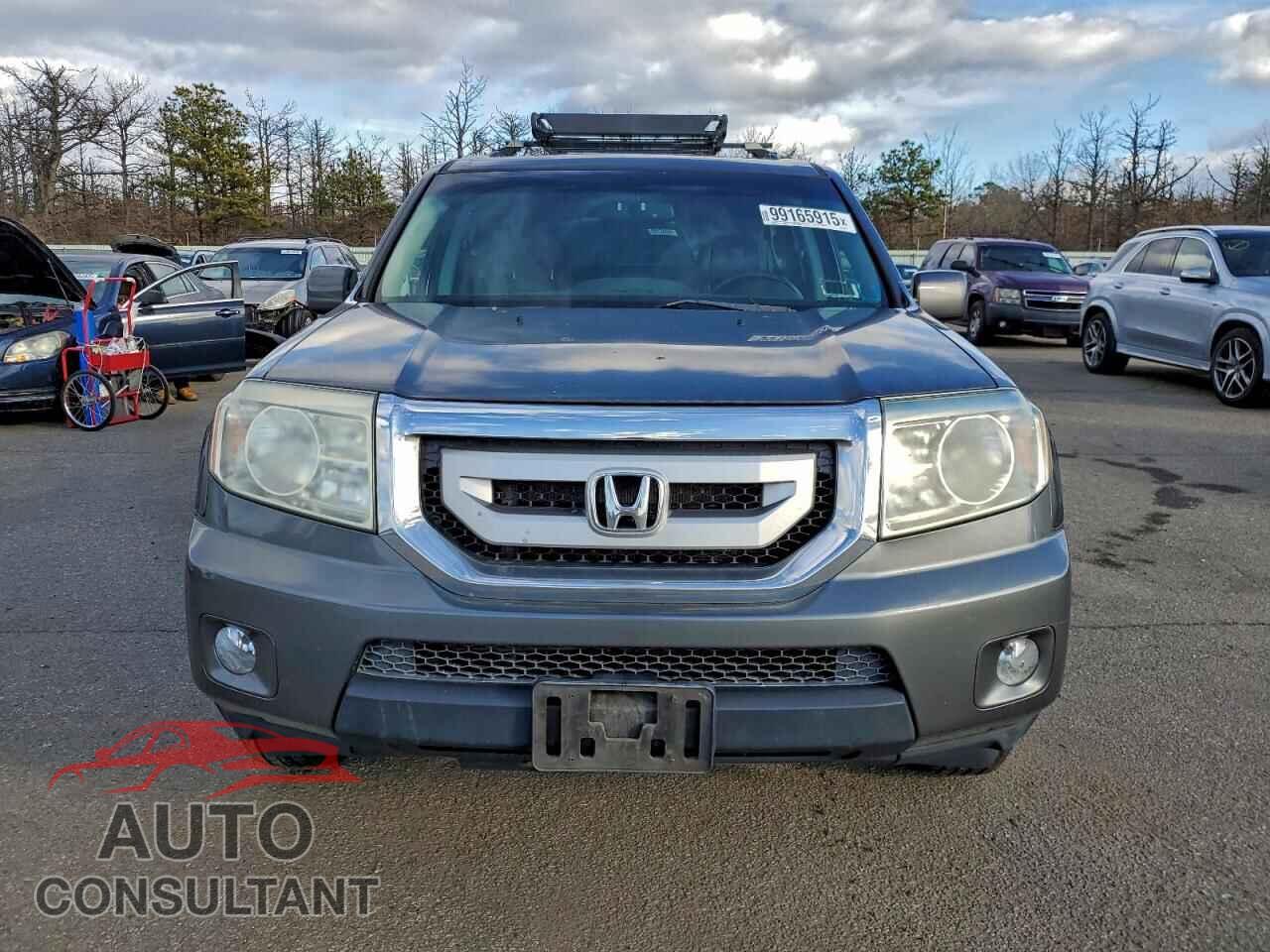HONDA PILOT 2011 - 5FNYF4H71BB059573