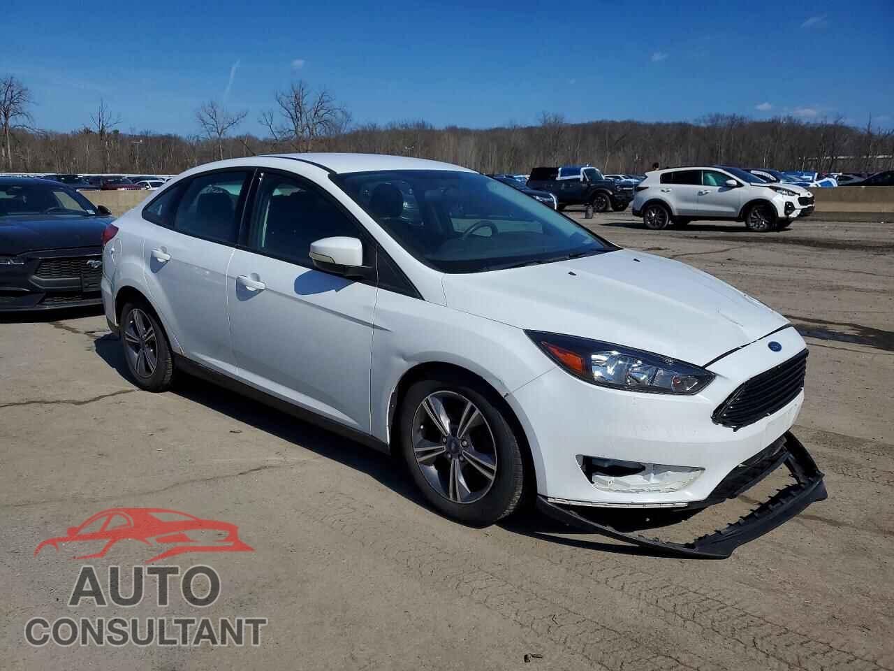 FORD FOCUS 2017 - 1FADP3FE7HL283076