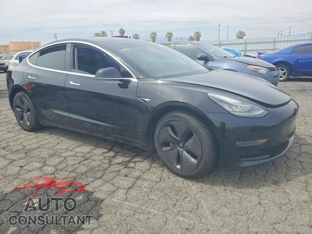 TESLA MODEL 3 2018 - 5YJ3E1EB0JF068073