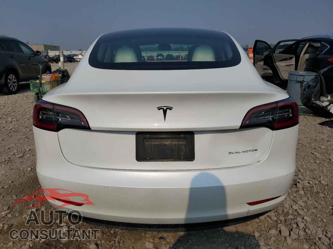 TESLA MODEL 3 2021 - 5YJ3E1EB9MF067525