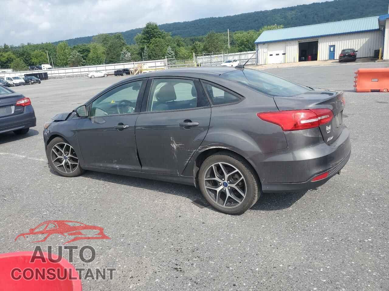 FORD FOCUS 2017 - 1FADP3FE9HL297643