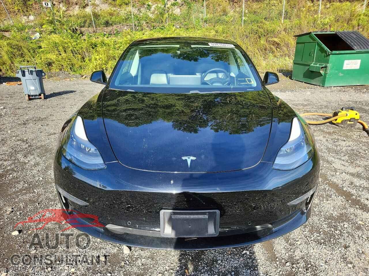 TESLA MODEL 3 2021 - 5YJ3E1EB0MF992565