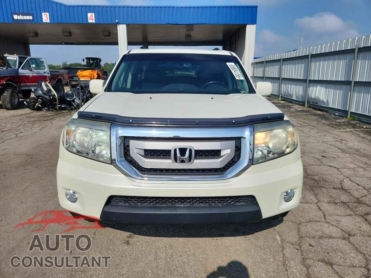 HONDA PILOT 2011 - 5FNYF4H94BB040193