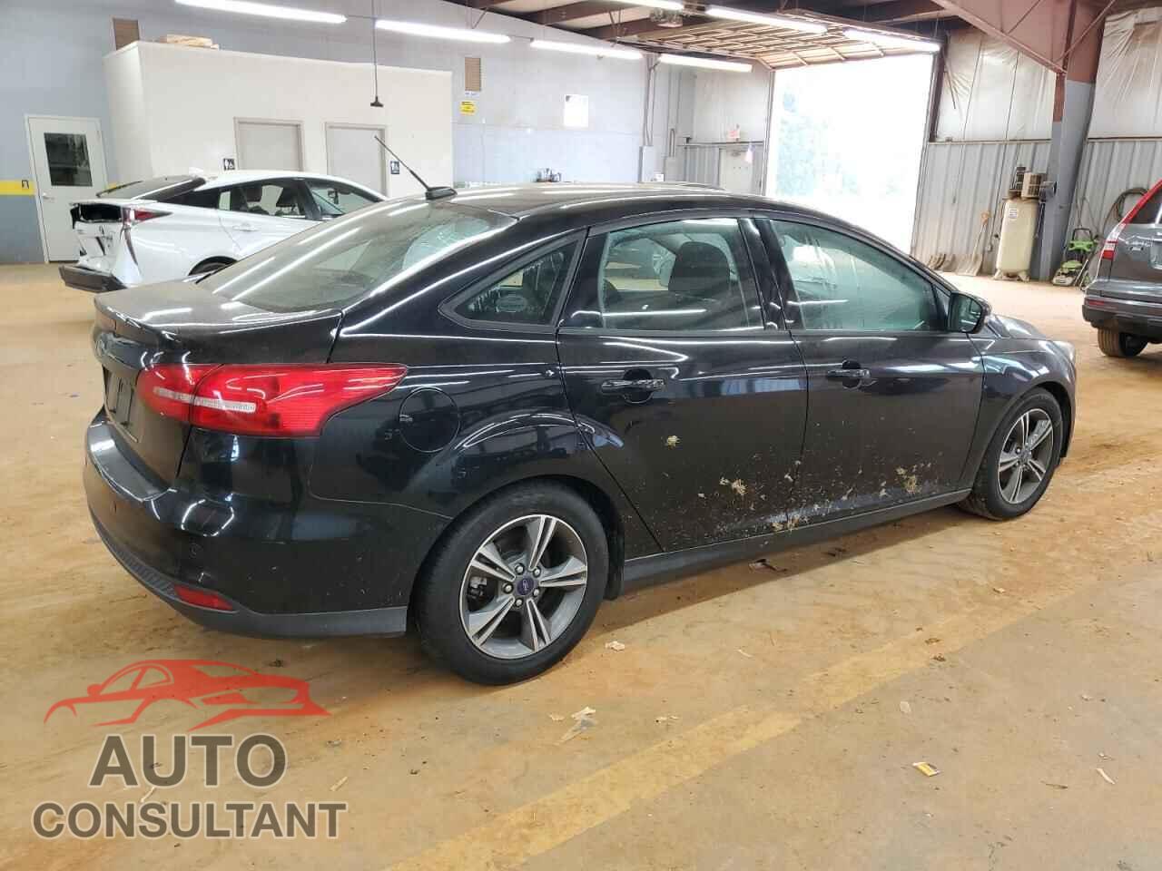FORD FOCUS 2016 - 1FADP3FE5GL298514