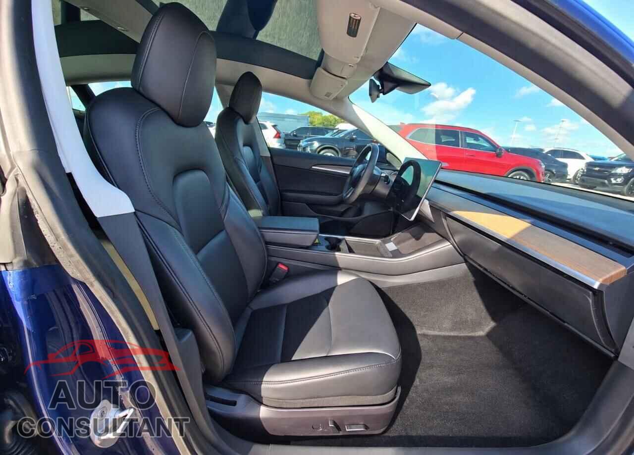 TESLA MODEL 3 2021 - 5YJ3E1EA9MF090469