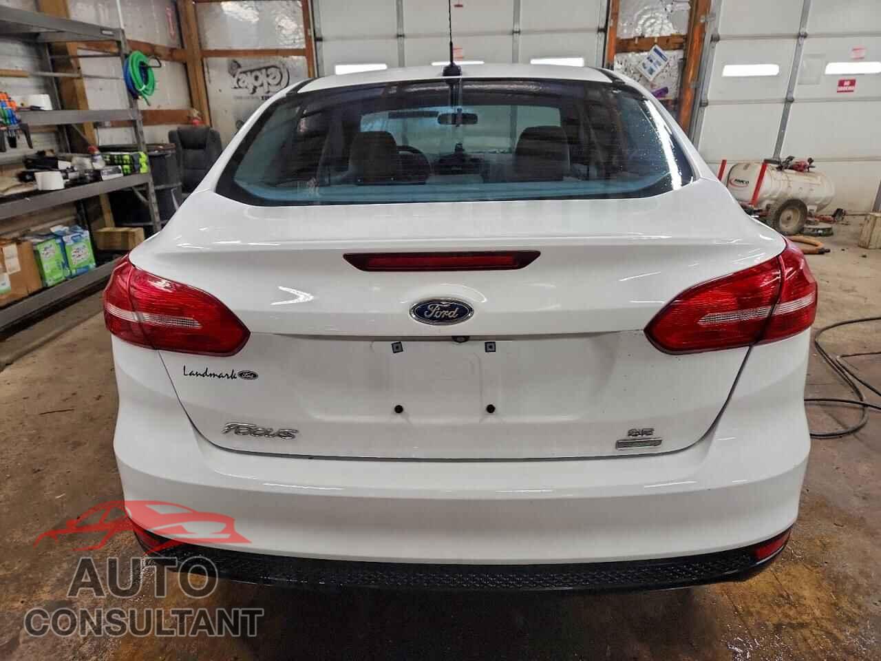 FORD FOCUS 2016 - 1FADP3FE3GL403096
