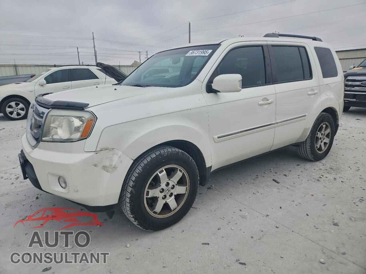 HONDA PILOT 2011 - 5FNYF3H92BB041529