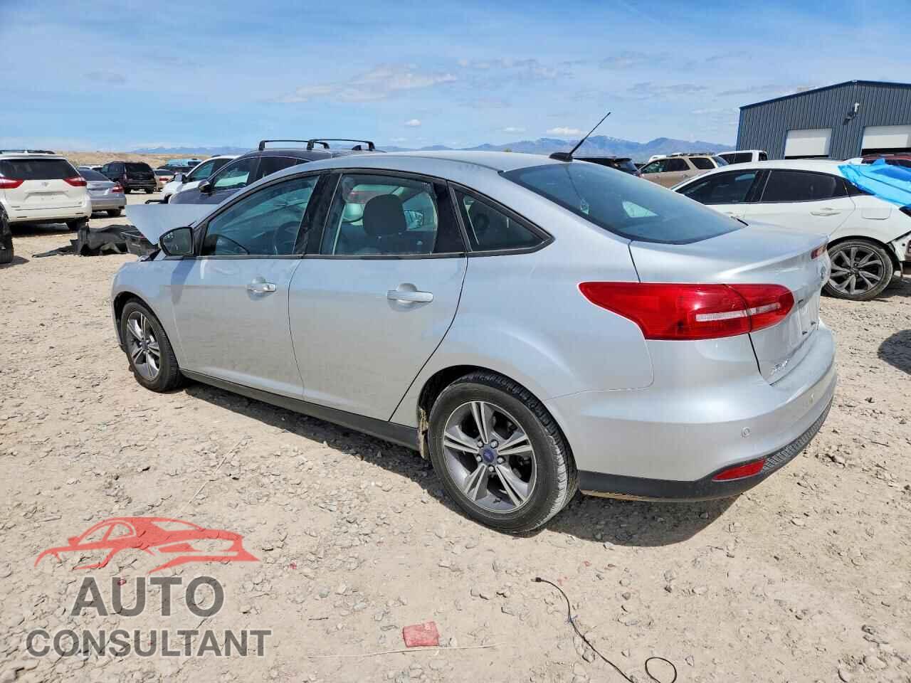 FORD FOCUS 2016 - 1FADP3FE1GL405302