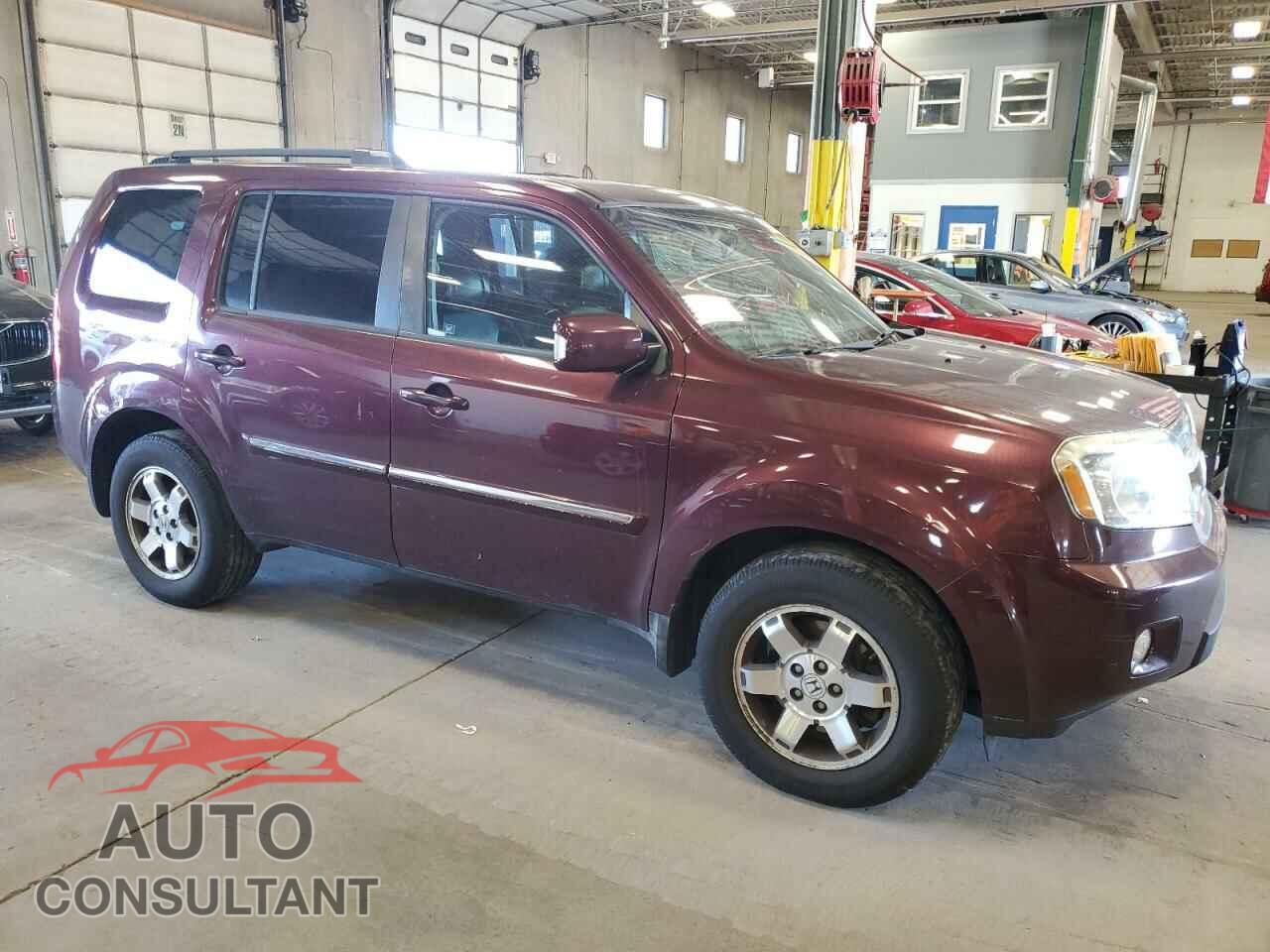 HONDA PILOT 2011 - 5FNYF4H90BB030129