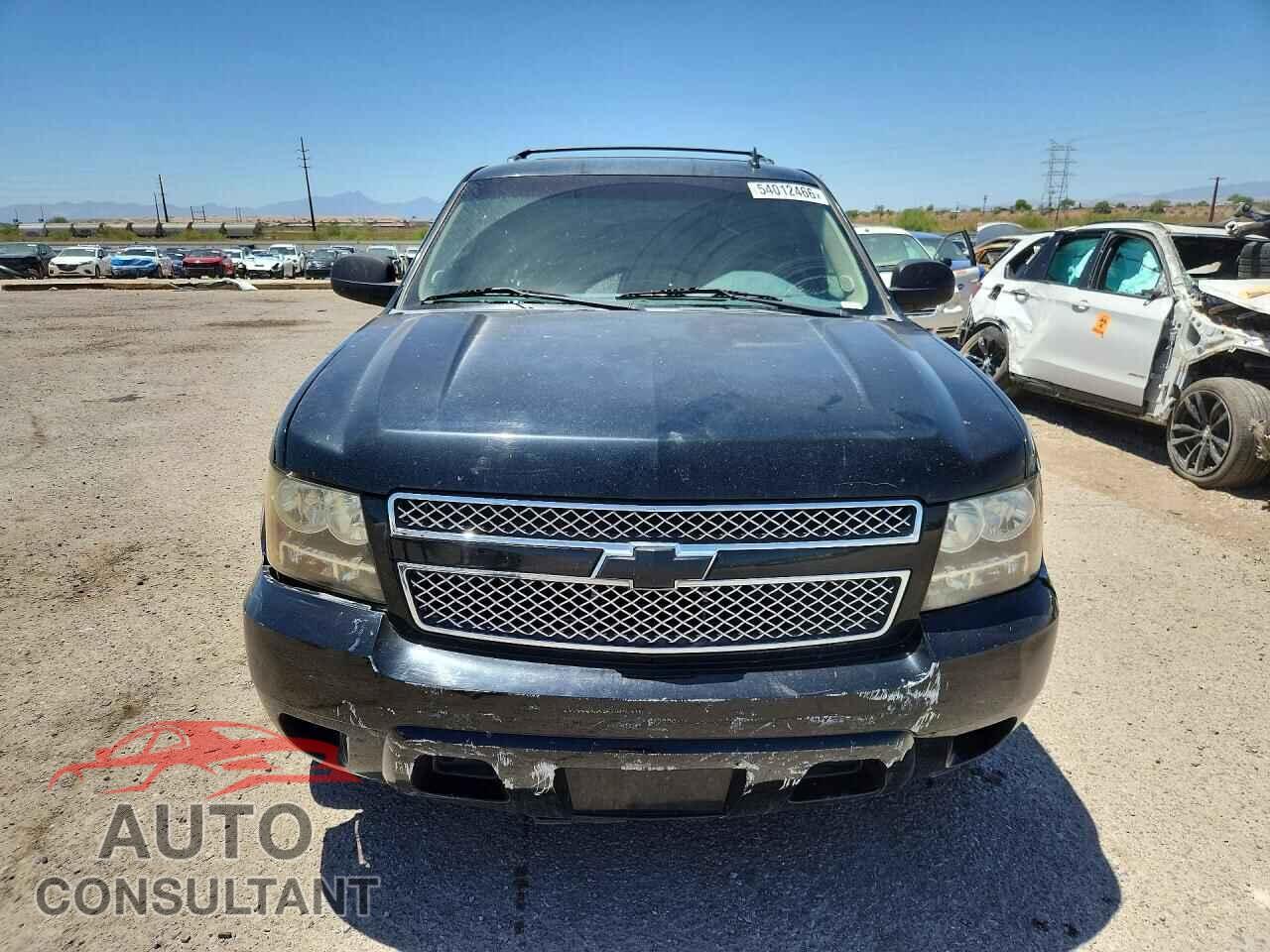 CHEVROLET TAHOE 2011 - 1GNSCAE04BR237532